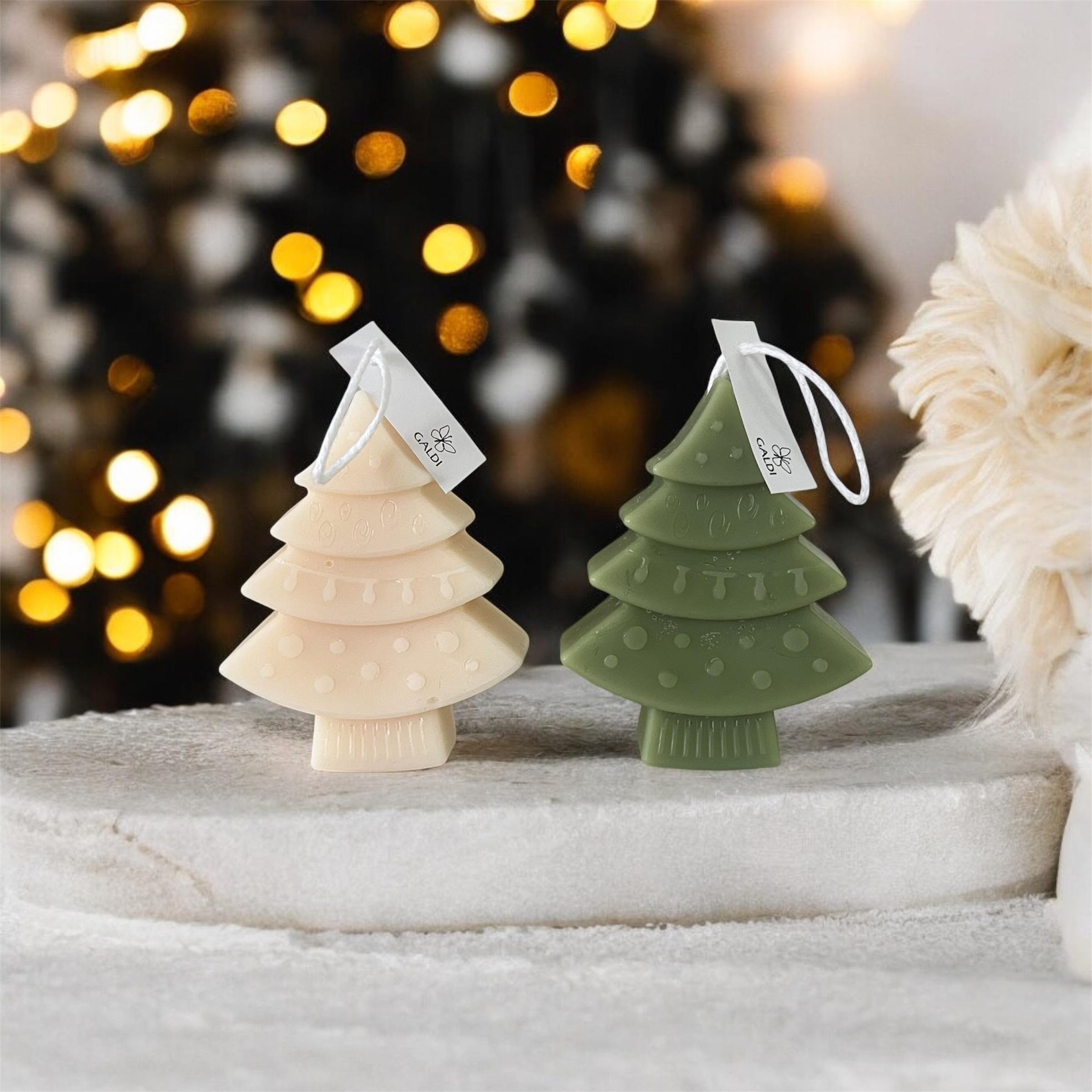 Hand-poured candles shaped like Christmas trees